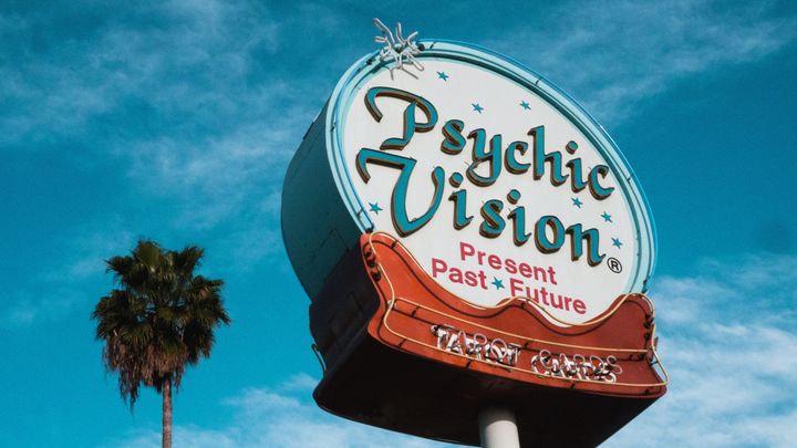 American roadside sign saying Psychic vision present past future